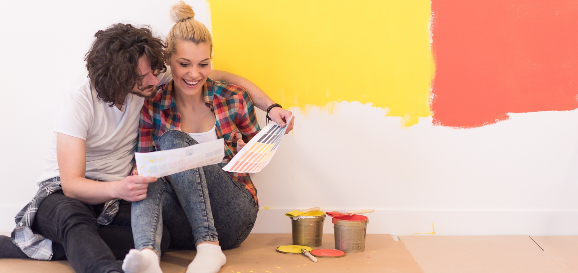 Couple looking at paint samples